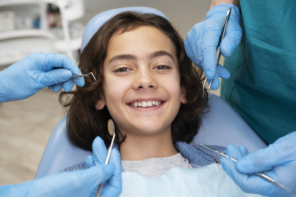 Teaching Kids to Brush Can Be Fun and Effective 7 close up boy dentist 1