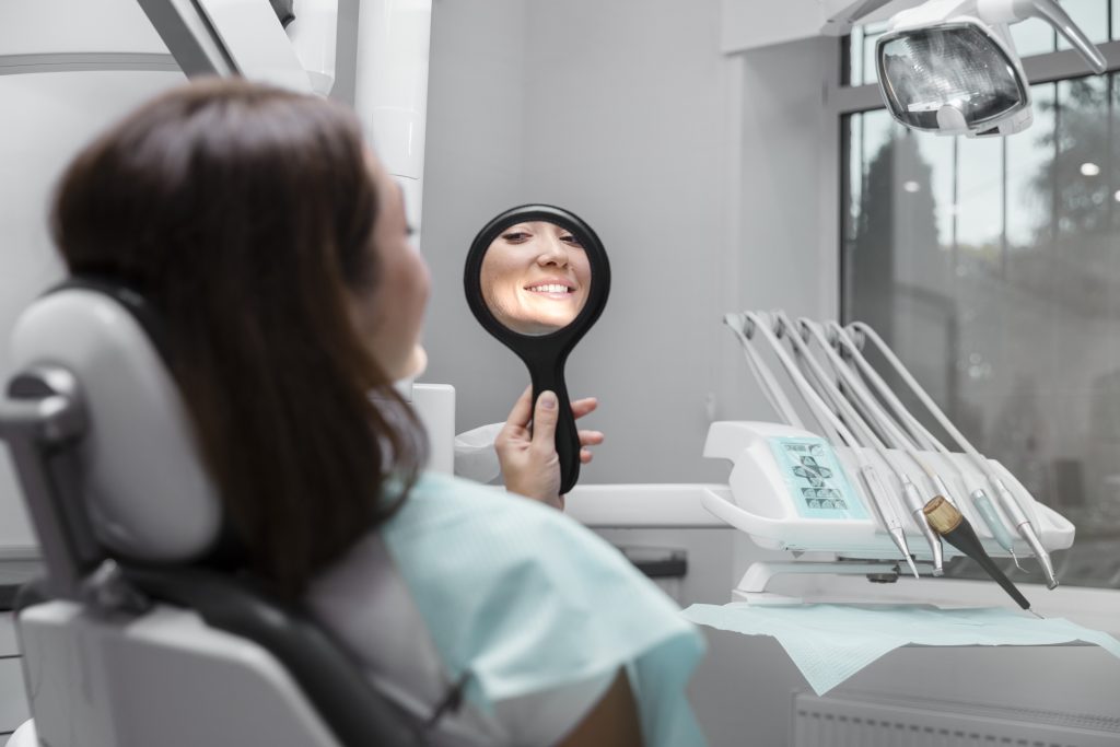 close up patient looking mirror